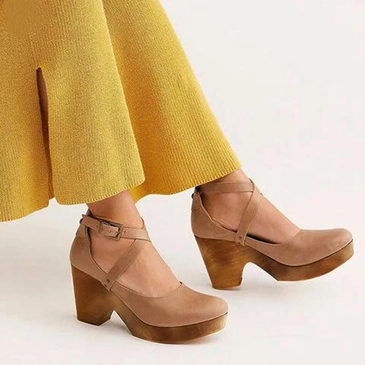 Fashionable women's closed-toe Mary-Jane platform wedge heels with an ankle strap, ideal for versatile wear.