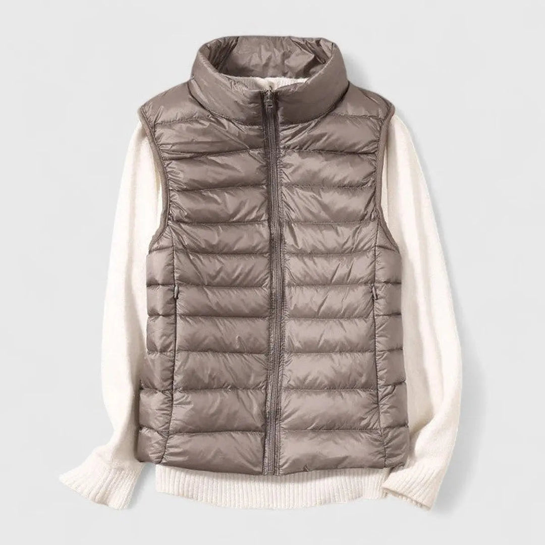 Side view of a casual women's gilet, sleek fit, quilted pattern, great for active lightweight wear.