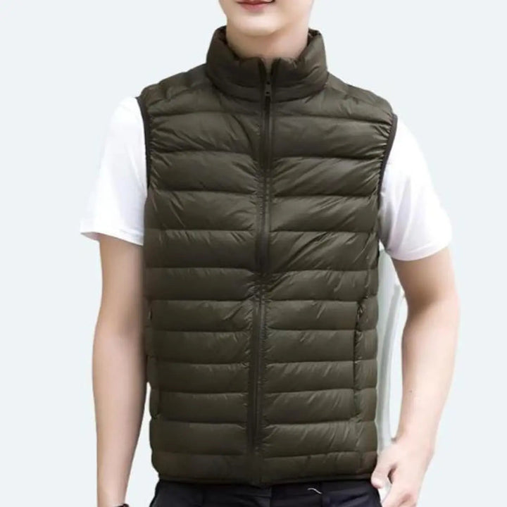 Versatile women's sleeveless quilted zip-up vest, lightweight outerwear for seasonal layering & comfort.