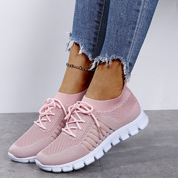 Women's lightweight walking sneakers with breathable mesh, cushioned sole, slip-resistant, ideal for comfort and style.