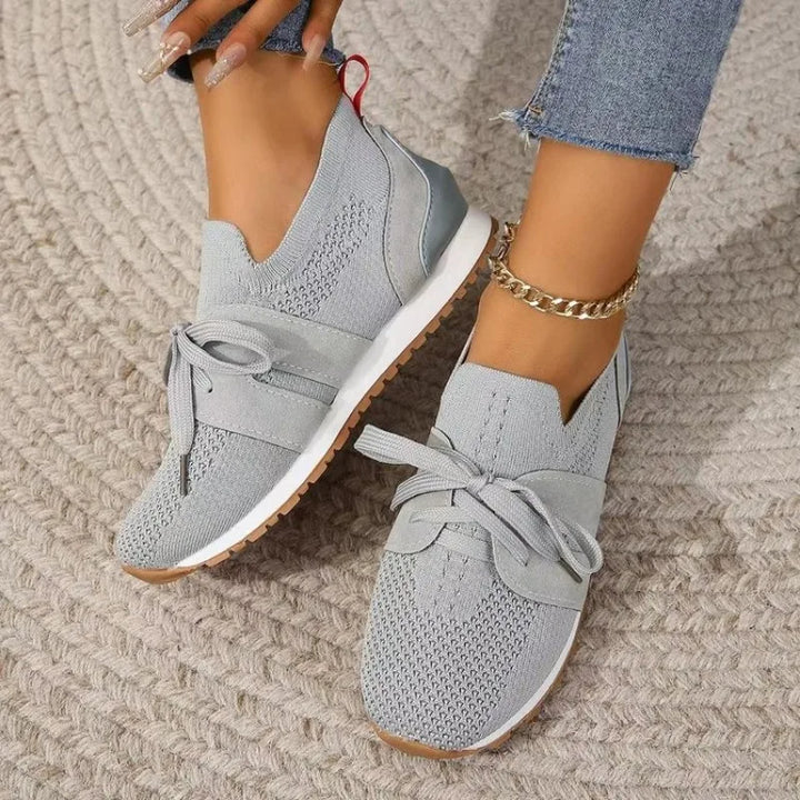 "Women's lightweight walking sneakers with breathable mesh upper, soft cushioning, and supportive natural flex sole"