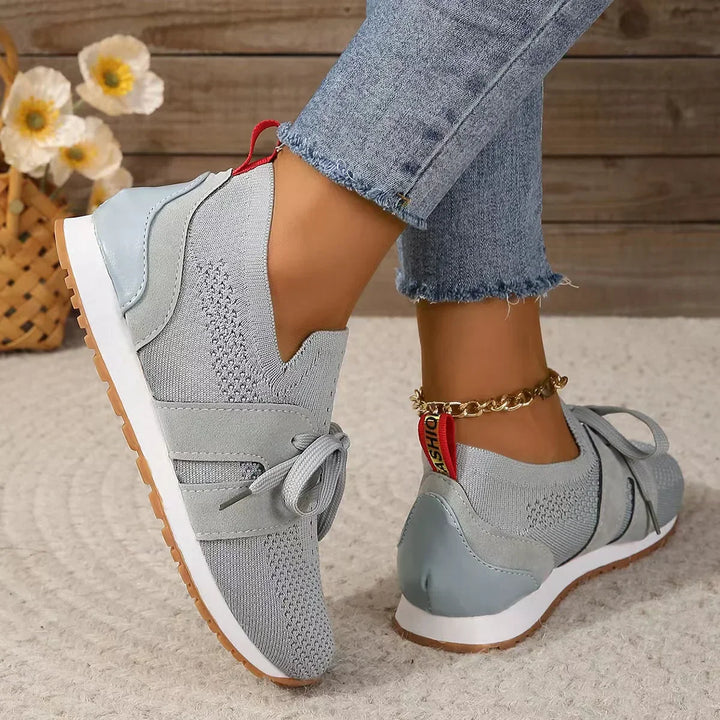 "Women's lightweight walking sneakers with breathable mesh upper, soft cushioning, and supportive natural flex sole"