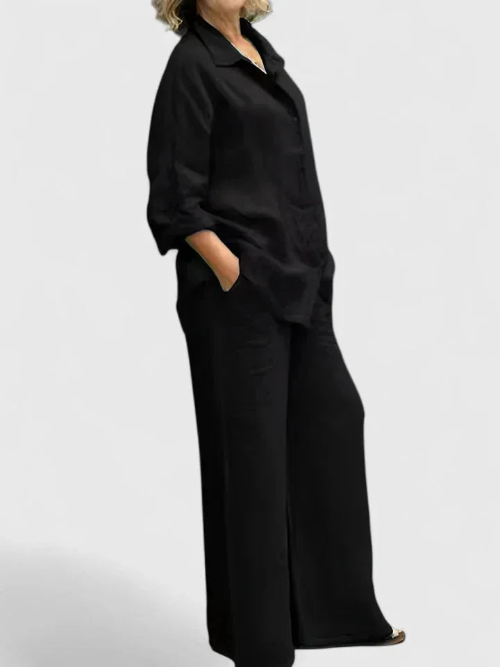 Versatile women's two-piece outfit: button-down shirt & wide leg pants, suitable for smart casual occasions.