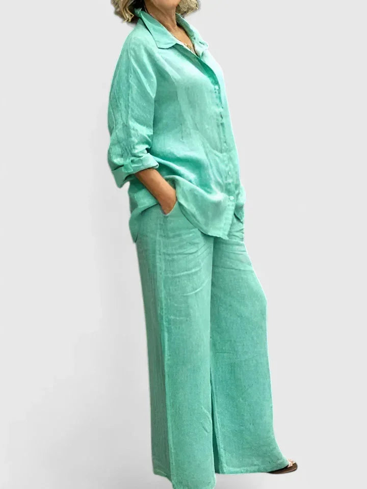 Elegant women's wide leg pants paired with a relaxed button-down shirt for a chic, comfortable ensemble.
