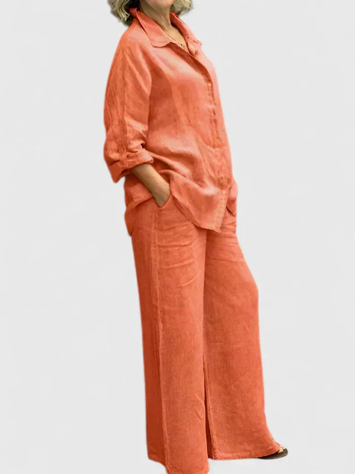 Stylish women's button-down shirt and matching wide leg pants set, ideal for comfortable everyday wear.