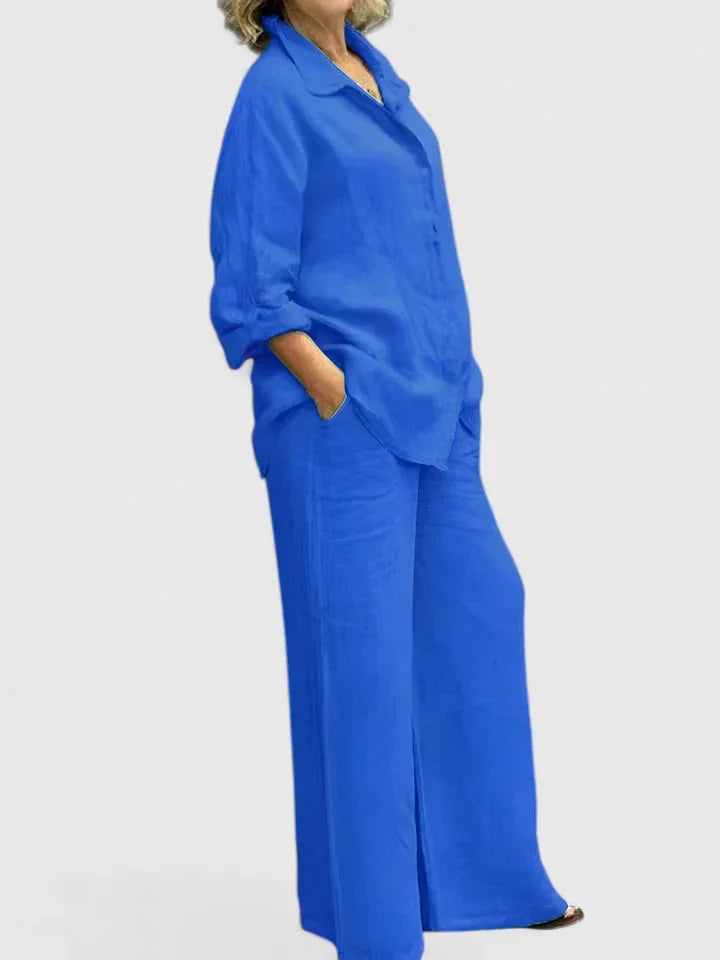 Sophisticated women's relaxed fit button-down shirt and wide leg pant set for comfortable, stylish wear.