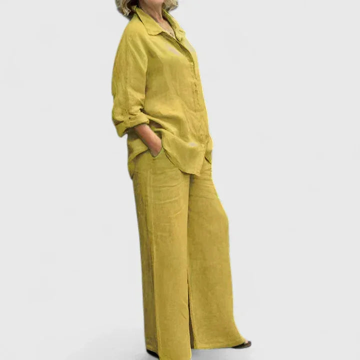 Stylish women's comfortable two-piece set with a relaxed button-down top and flattering wide leg pants.