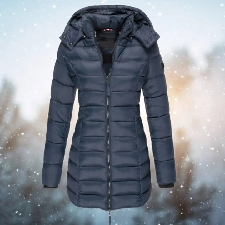 Women's longline hooded quilted puffer jacket, a stylish winter outerwear piece.