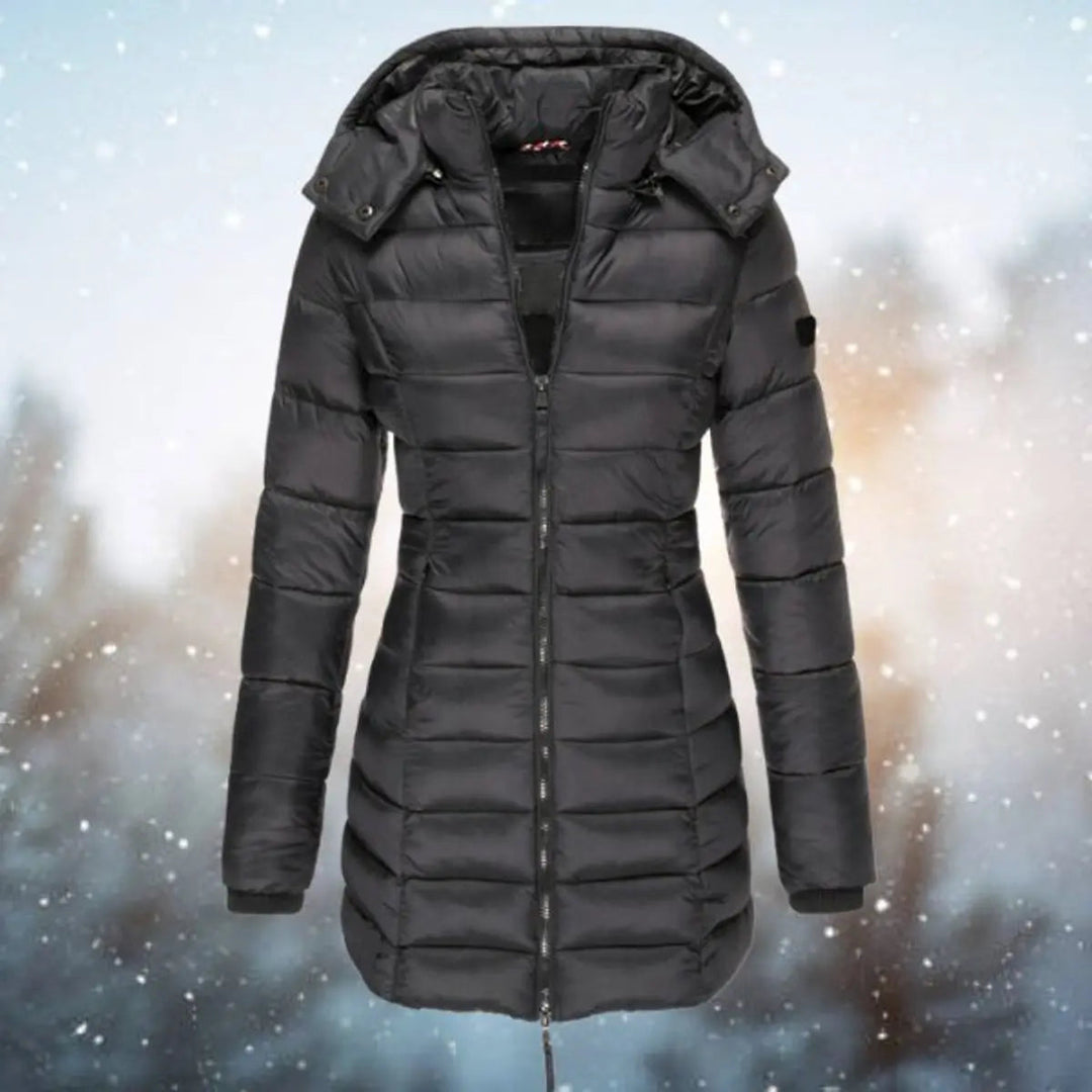 Zip-front women's longline hooded quilted puffer jacket, offering ultimate winter warmth.