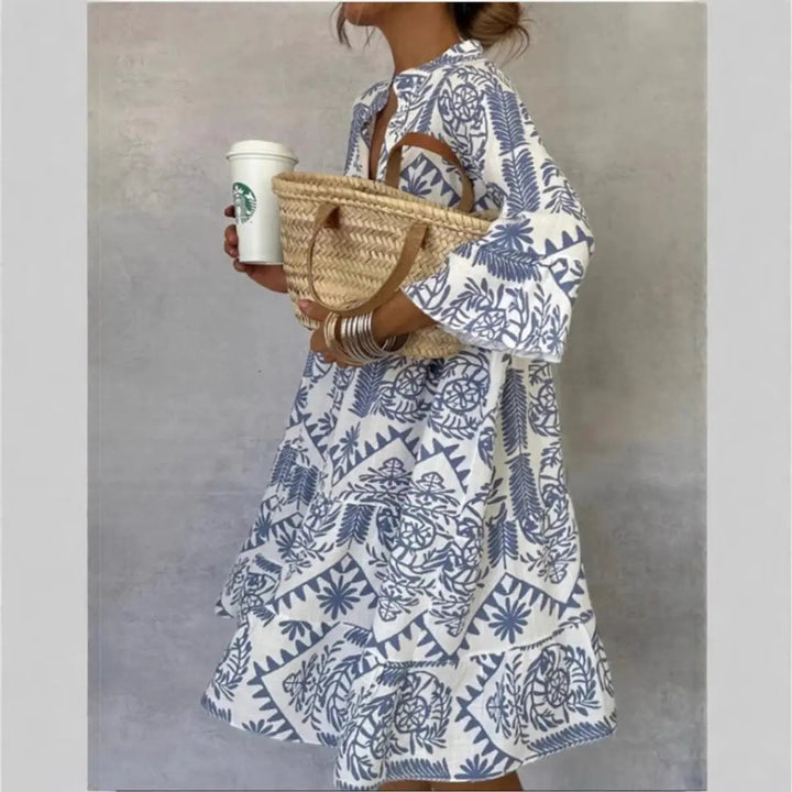 Women's loose fit floral print tunic dress, perfect for summer casual wear & warm weather comfort.