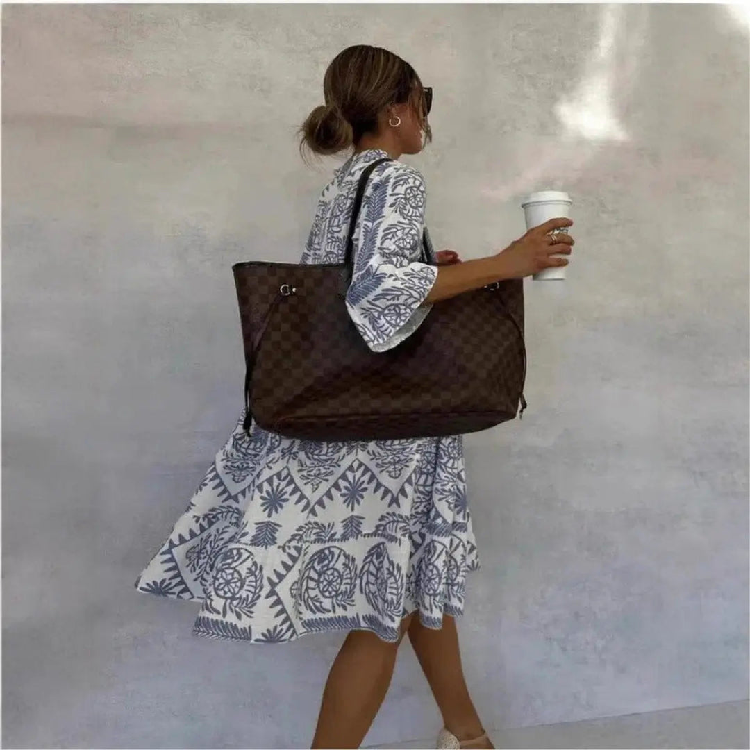 Comfortable women's floral print tunic dress, loose fit, perfect for warm weather and summer style.