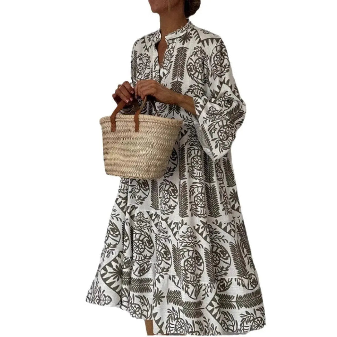 Vibrant floral print loose fit women's summer dress, a stylish and comfortable tunic for casual wear.