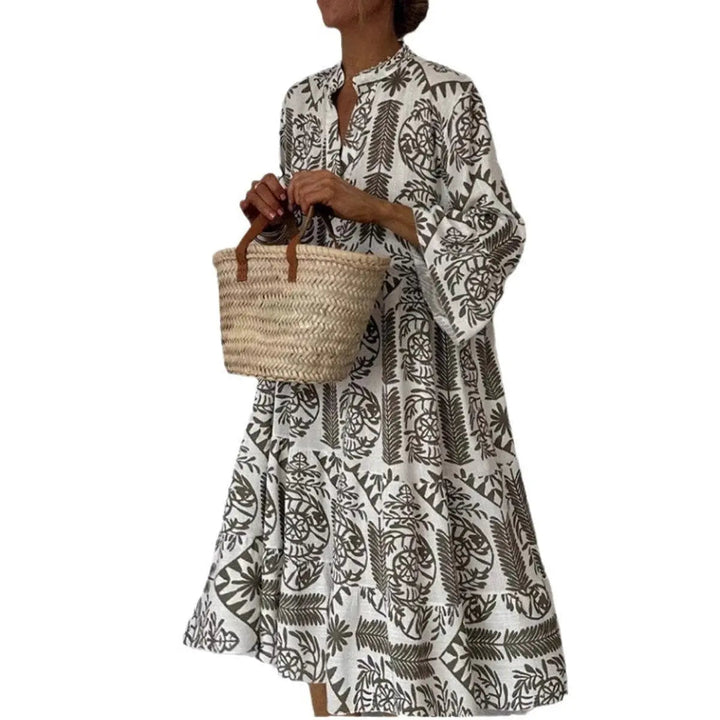 Vibrant floral print loose fit women's summer dress, a stylish and comfortable tunic for casual wear.