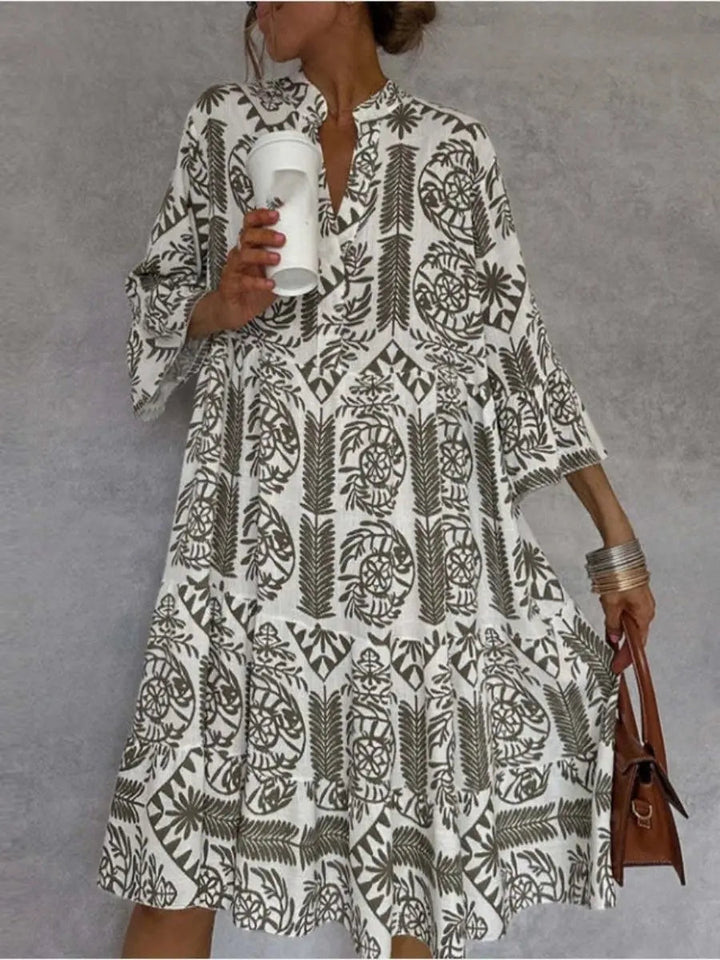 Casual loose fit floral print mini tunic dress for women, great for summer, beach, or everyday comfort.