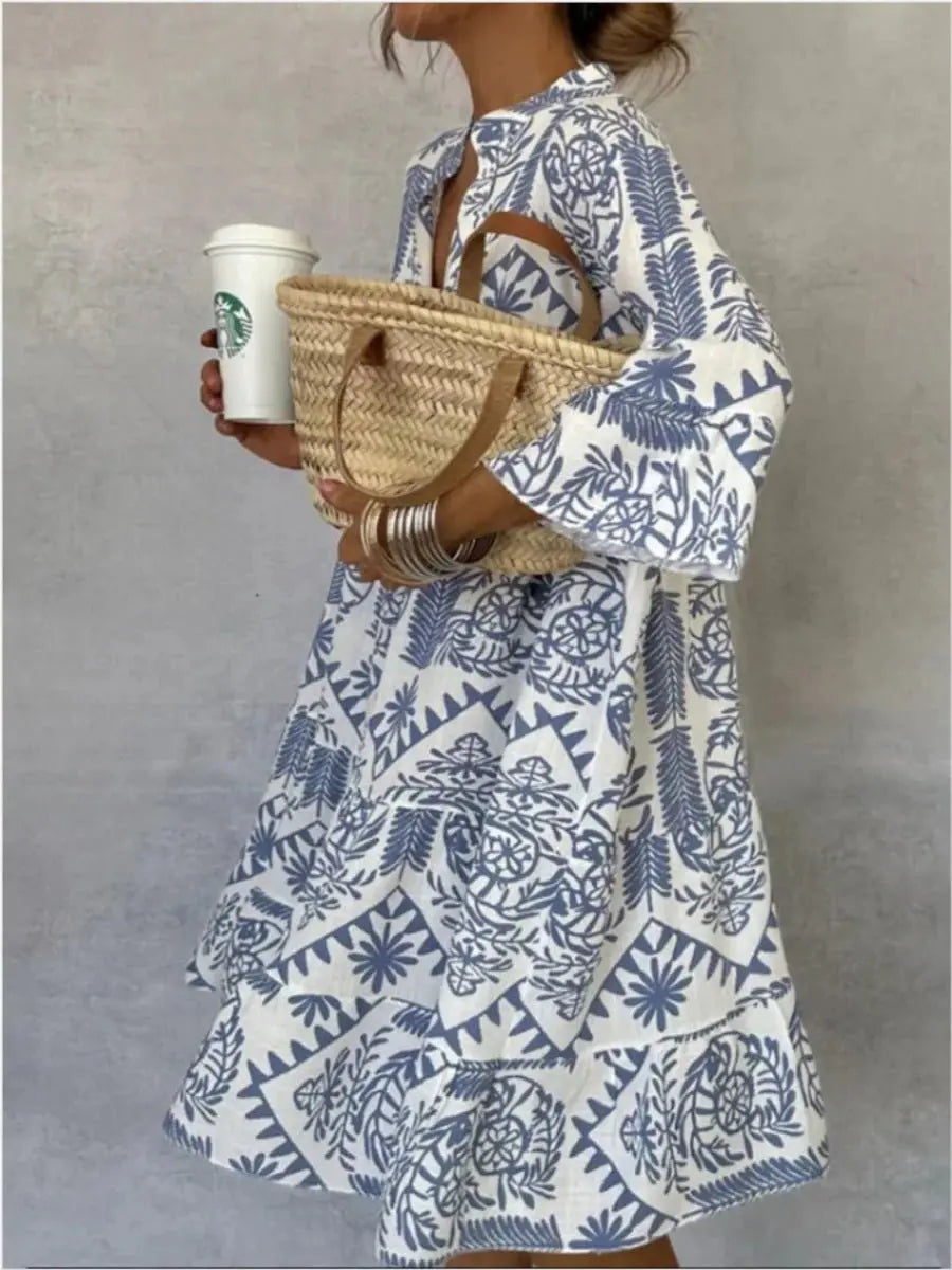 Women's short floral print tunic dress, loose fit and comfortable, perfect for summer boho style.