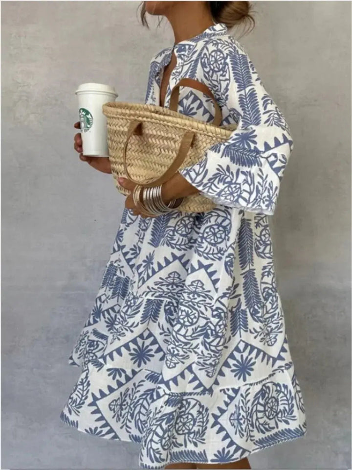 Women's short floral print tunic dress, loose fit and comfortable, perfect for summer boho style.
