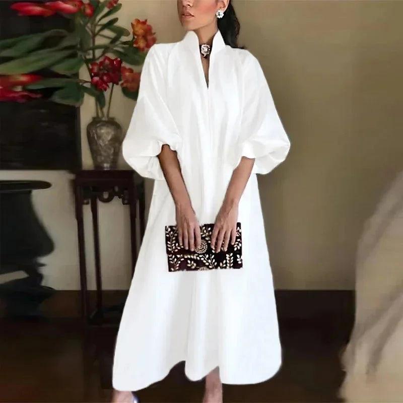 Elegant high-neck sleeveless maxi dress for women, flowing and comfortable, perfect for summer evenings or casual wear.