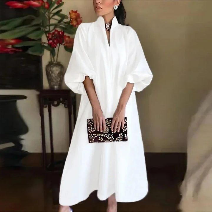 Elegant high-neck sleeveless maxi dress for women, flowing and comfortable, perfect for summer evenings or casual wear.