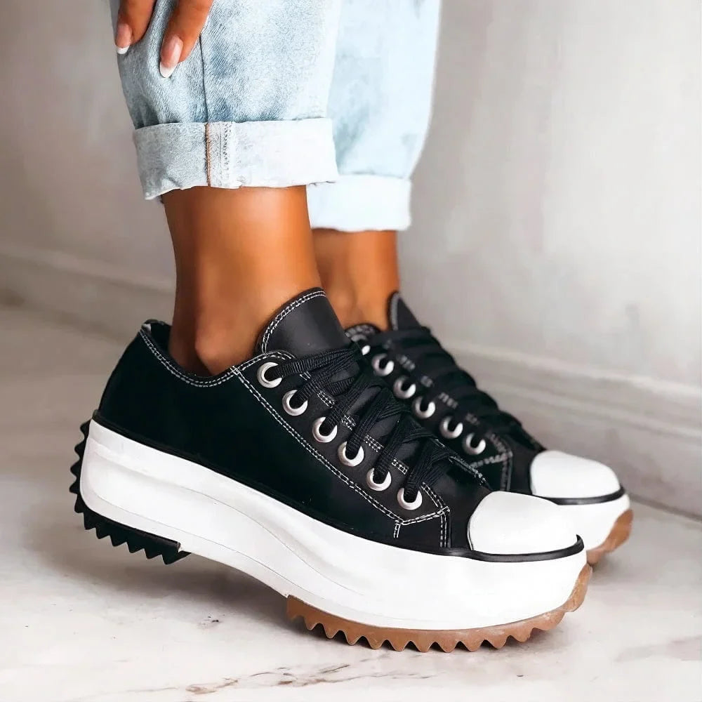 Women's chic low-top platform sneakers with chunky sole, lace-up design, perfect for casual comfort & style.