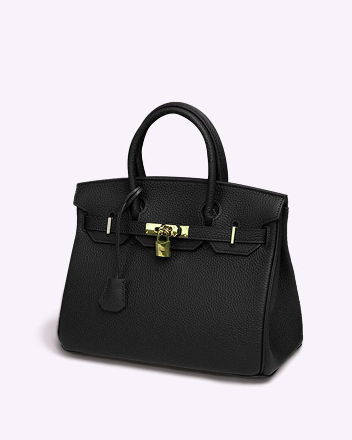 Women's luxury leather shoulder bag; elegant brown design with adjustable strap, perfect for any occasion; timeless style.