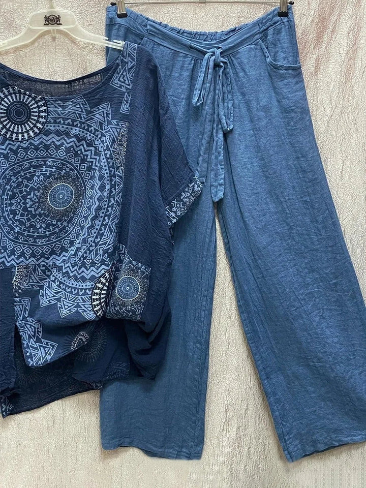 Mandala print wide leg pants set for women featuring a stylish top & drawstring waist. Boho chic summer outfit.