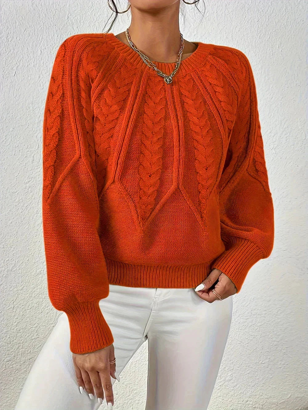 Elegant women's cable knit crew neck sweater, cozy fall fashion knitwear with classic design.