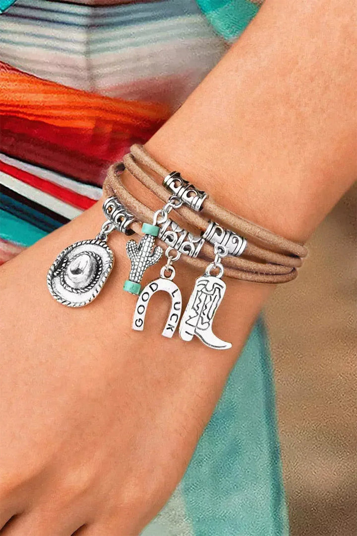 Women's silver Western charm bracelet with hat, boot, and cactus. Perfect for cowgirl fashion jewelry.