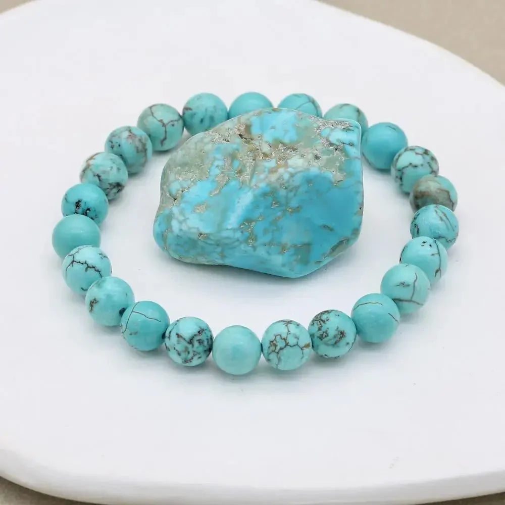 Elegant women's bracelet with genuine turquoise beads. Stretch design for comfort and easy fit.