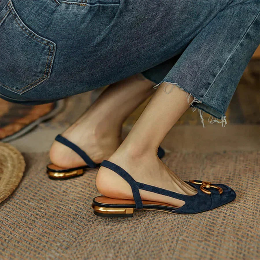 Comfortable navy square-toe slingback sandals, ideal as summer flats or dress shoes.