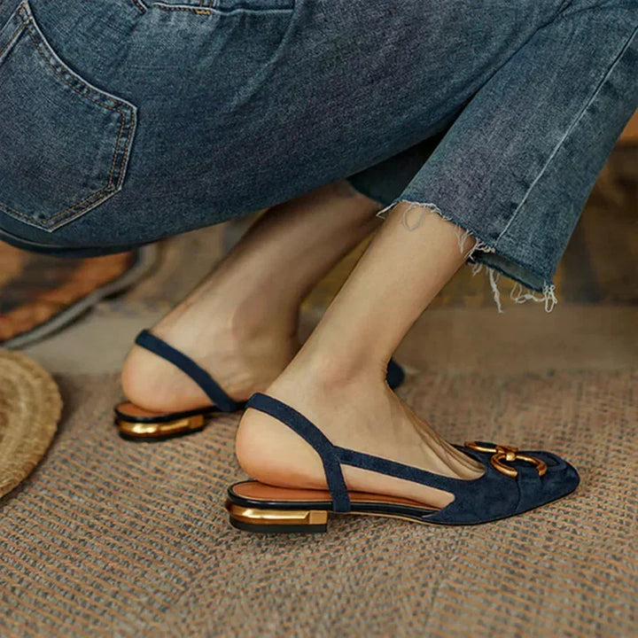 Comfortable navy square-toe slingback sandals, ideal as summer flats or dress shoes.