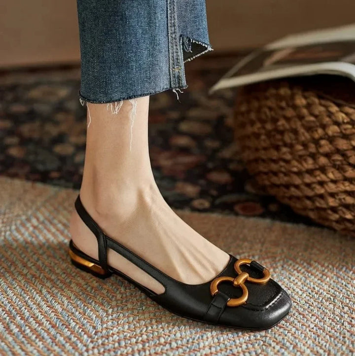 Navy square-toe slingback sandals for women, secure gold buckle closure, versatile summer wear.