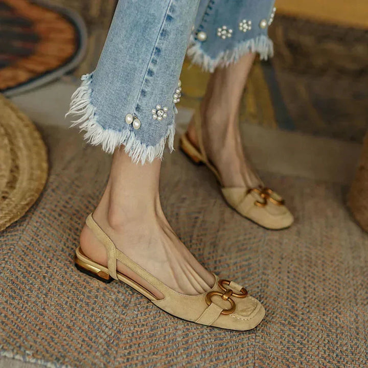 Chic women's navy square-toe slingback sandals, featuring a stylish gold buckle for summer fashion.