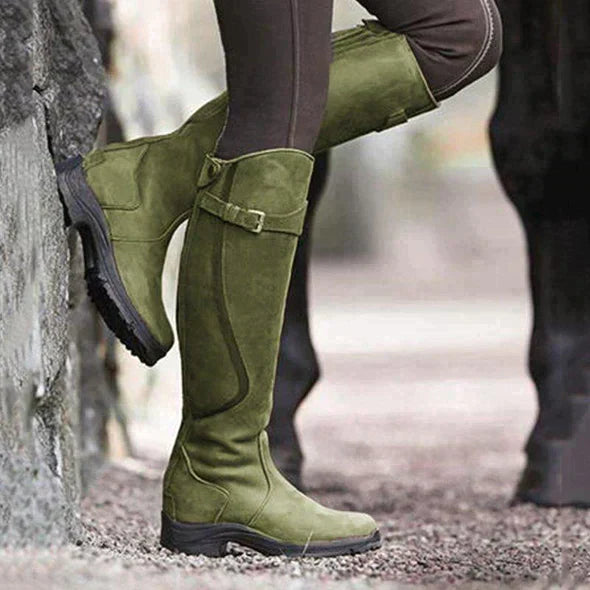 "Women's Nova Waterproof Leather Boots, shown in dark brown, showcasing robust leather exterior and cushioned insole for comf