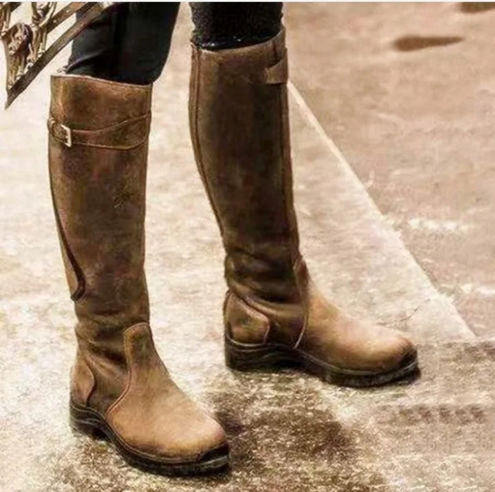 "Women's Nova Waterproof Leather Boots, shown in dark brown, showcasing robust leather exterior and cushioned insole for comf
