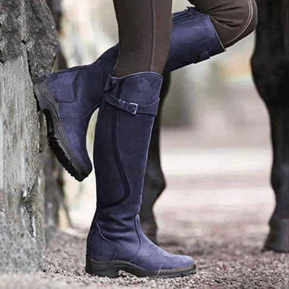 "Women's Nova Waterproof Leather Boots, shown in dark brown, showcasing robust leather exterior and cushioned insole for comf