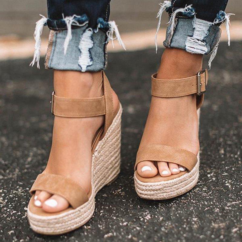 Women's open-toe ankle strap wedge sandals, chic design, versatile summer footwear, day-to-night elegance and comfort.