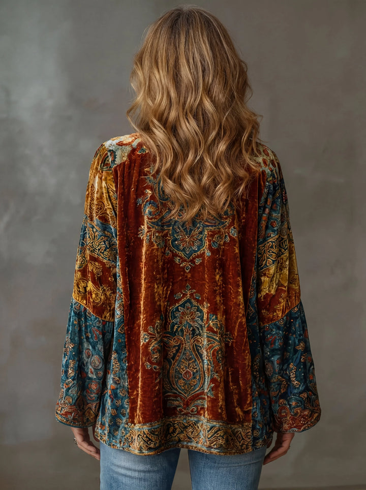 Elegant women's boho kimono jacket. Features ornate patterns, wide bell sleeves, and a flowy design for stylish outerwear.