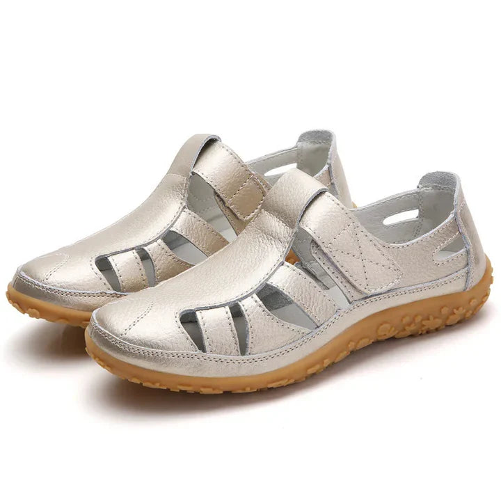 Women's orthopedic anti-slip sandals with adjustable straps in black, offering superior arch support and breathable design.