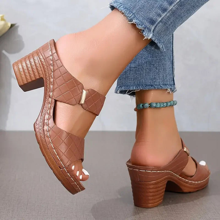 Fashion-forward women's platform block-heel sandals with a unique quilted design. Supportive & chic.