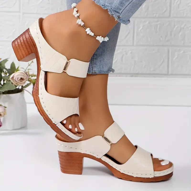 Supportive women's platform sandals with a comfortable block heel & trendy quilted upper.