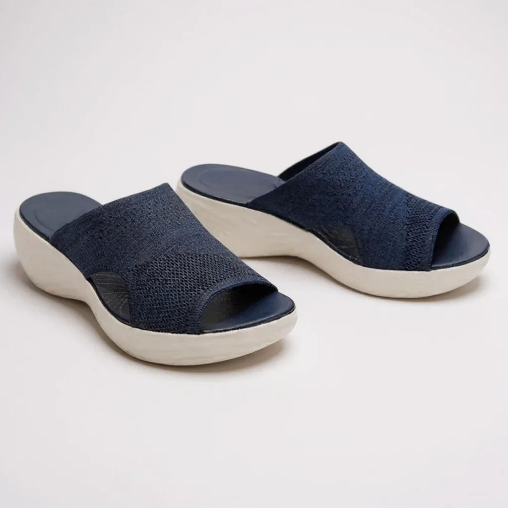 Casual women's orthopedic slide sandals featuring open-toe wedge sole for support, comfort & summer style.