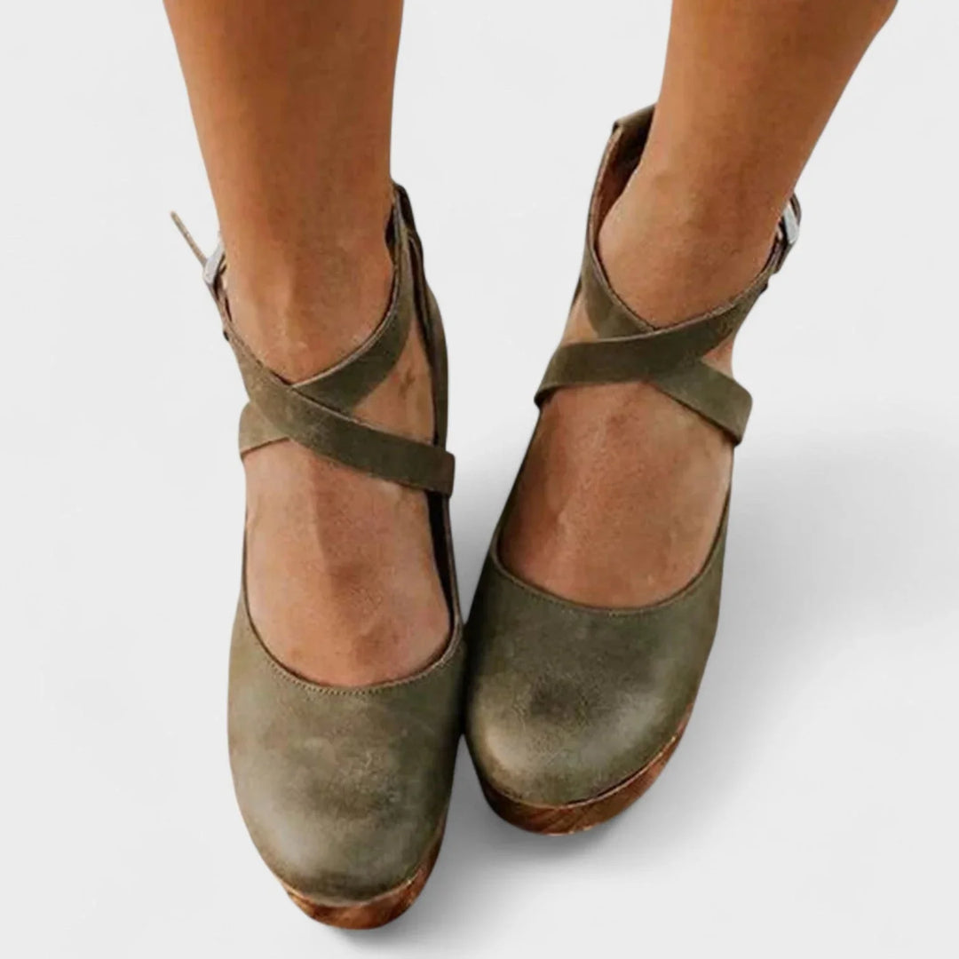 Elegant women's closed-toe platform sandals with ankle strap, perfect summer footwear for comfortable style.