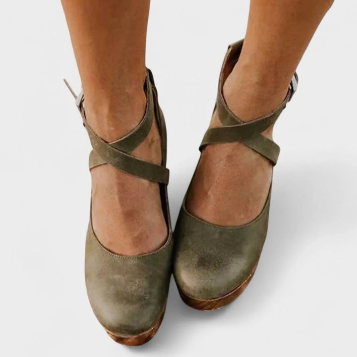 Elegant women's closed-toe platform sandals with ankle strap, perfect summer footwear for comfortable style.