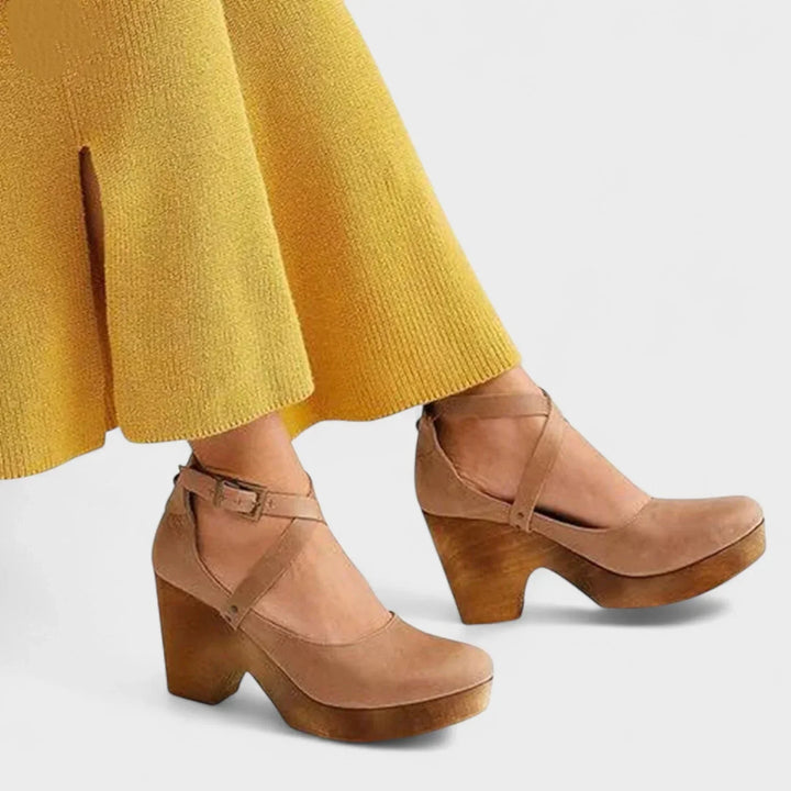 Women's orthopedic closed-toe platform sandals featuring an adjustable ankle strap buckle for secure, comfortable fit.