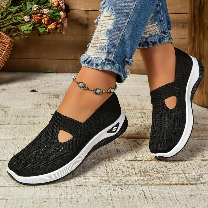 Women's orthopedic slip-on shoes with arch support, featuring a sleek, breathable design for ultimate comfort and style.
