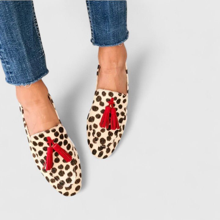 Women's orthopaedic slip-on loafers with stylish leopard print & tassels. Comfortable everyday casual shoes for foot health.