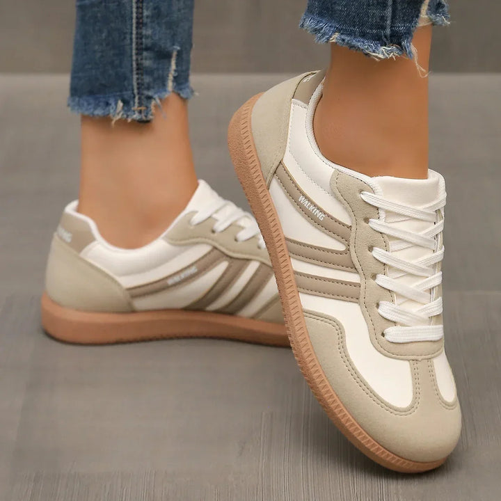 "Women's orthopedic walking sneakers with arch support, lightweight, breathable, casual design for comfort and style."