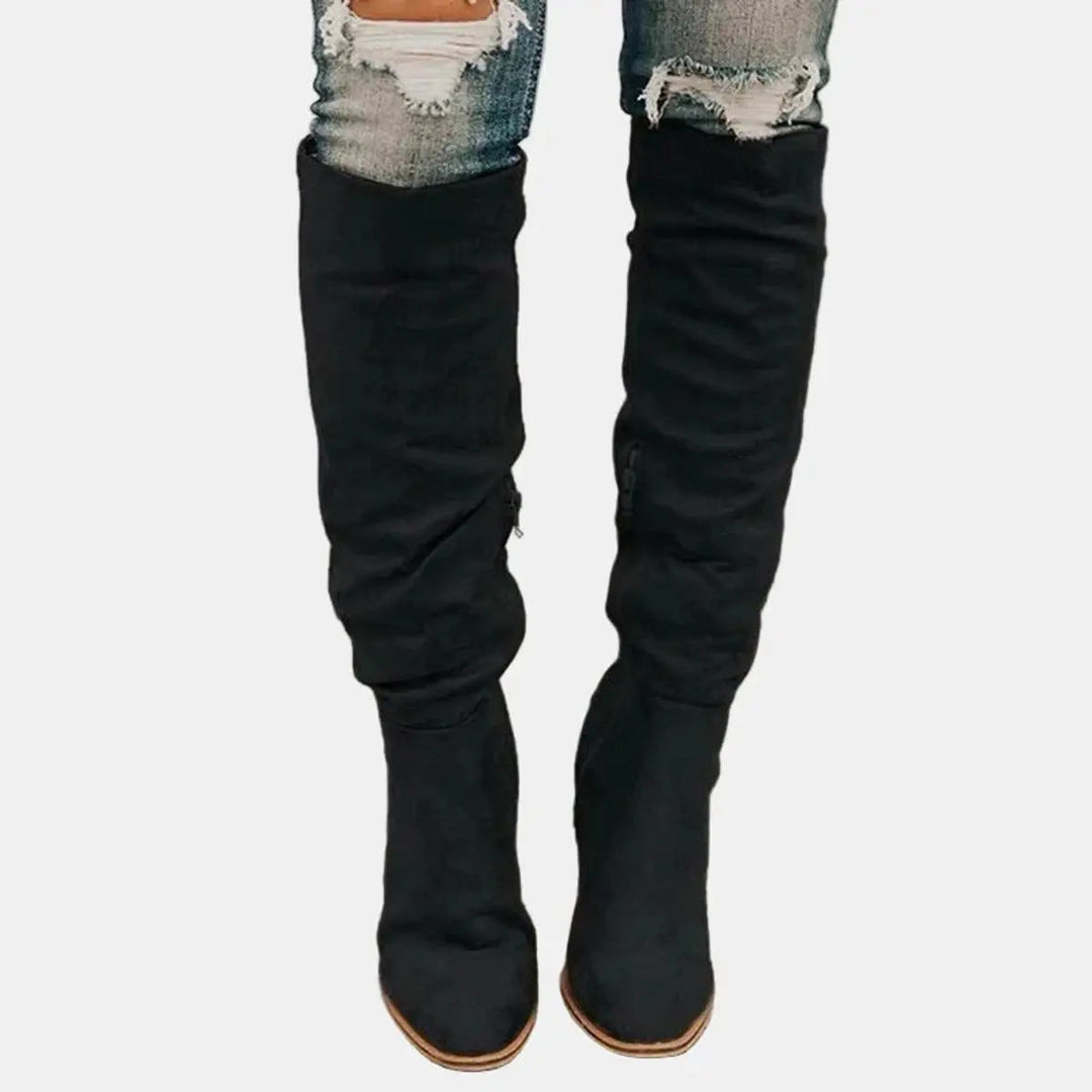 Comfortable women's over-the-knee boots with a stable block heel. Perfect for elegant autumn/winter style.
