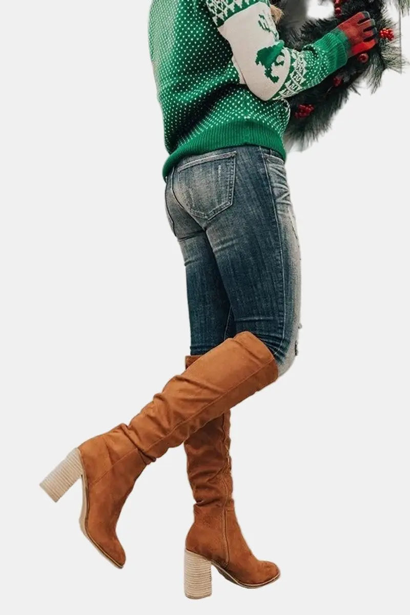 Fashionable women's over-the-knee boots with sturdy block heels. Elegant & comfortable tall winter footwear.