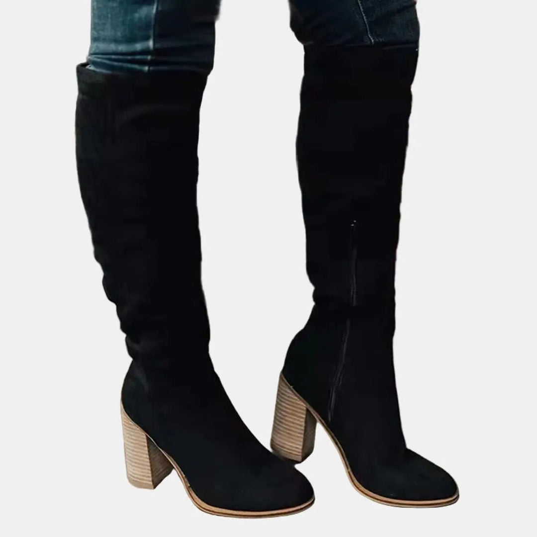 Comfortable women's over-the-knee block heel boots for all-day wear. Elegant tall boots for chic winter style.